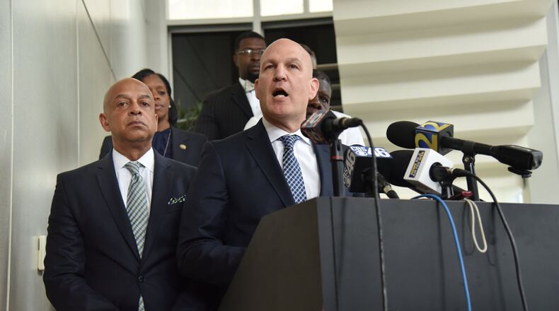DeKalb County Sheriff Jeff Mann (left) stands next to his attorney Noah Pines as he speaks for Mann during a press conference at DeKalb County Sheriff’s Office on Friday, May 12, 2017. Mann said he is suspending himself for one week. HYOSUB SHIN / HSHIN@AJC.COM