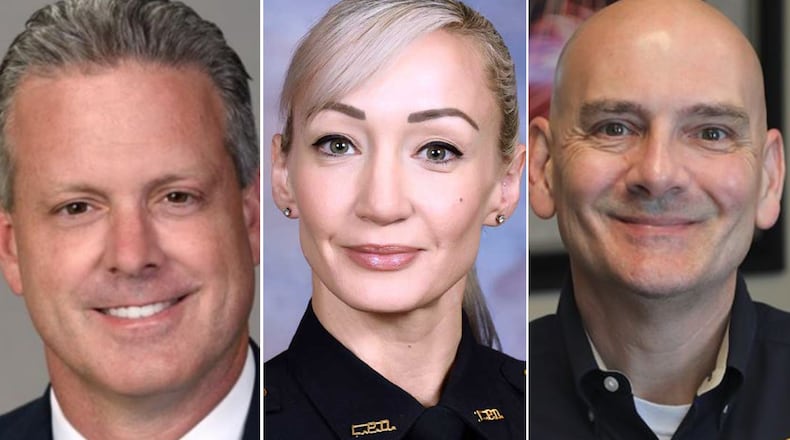 From left: Lawrenceville City Manager Chuck Warbington; Police Capt. Tawnya Gilovanni; and former Police Chief Tim Wallis.