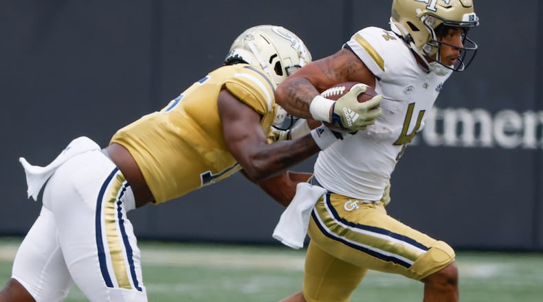 Dontae Smith breaks free for a nine yard run in the first quarter during Georgia Tech's spring football game in Atlanta on Saturday, April 15, 2023. (Bob Andres for the Atlanta Journal Constitution)