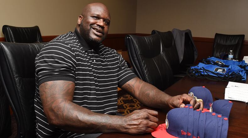 NEW ORLEANS, LA - FEBRUARY 17: Shaquille O'Neal signs autographs for the Boys & Girls Club of Southeast Louisiana with American Express at the NBA Store for NBA All-Star on February 17, 2017 in New Orleans, Louisiana. (Photo by Erika Goldring/Getty Images for American Express)