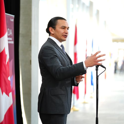 FILE - Manitoba Premier Wab Kinew talks to media as he arrives for a first ministers meeting in Ottawa on Jan.15, 2025. (Sean Kilpatrick/The Canadian Press via AP, File)