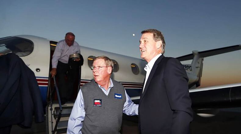 Sen. Johnny Isakson and Sen. David Perdue plan to vote yes on a bill to keep the government running into December. John Bazemore / Associate Press