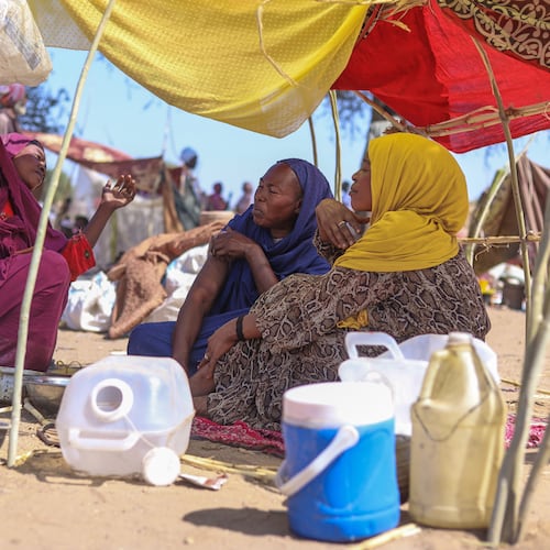 Sudanese who fled el-Fasher city, after Sudan's paramilitary forces killed hundreds of people in the western Darfur region, speak at their camp in Tawila, Sudan, Wednesday, Oct. 29, 2025. (AP Photo/Muhnnad Adam)