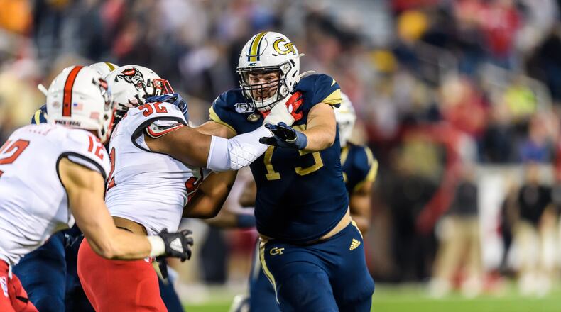 Georgia Tech offensive tackle Zach Quinney takes on a N.C. State defensive lineman Darrell Murchison during the Yellow Jackets' 28-26 win at Bobby Dodd Stadium November 21, 2019. (Danny Karnik/Georgia Tech Athletics)
