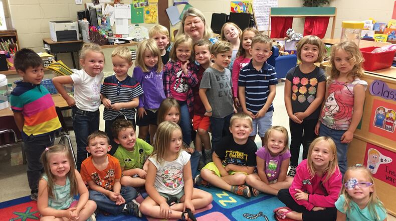 Letitia Cline of Cherokee Schools’ Office of Curriculum & Instruction celebrates Georgia PreK Week as a guest reader in teacher Whitney Hazlewood’s Georgia PreK class at R.M. Moore Elementary School in October 2017. Open preschool enrollment for the 2018-19 school year will run through May 11. CHEROKEE COUNTY SCHOOL DISTRICT