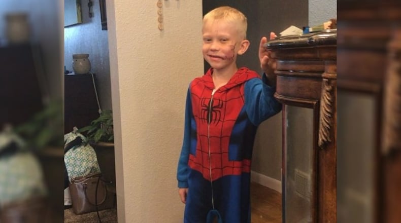 6-year-old Bridger Walker is recovering after getting dozens of stitches after stepping between his little sister and a charging dog.