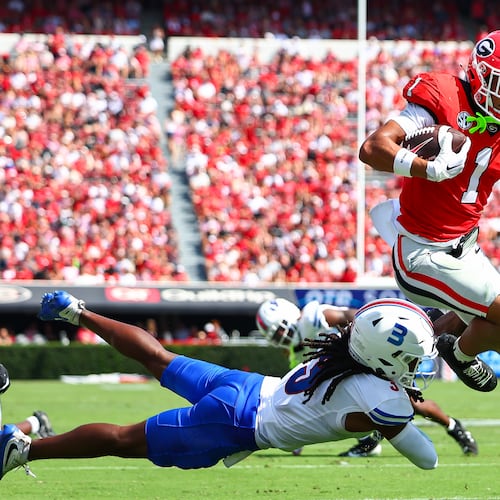 Georgia wide receiver Talyn Taylor hurdles Tennessee State defensive back Mikeece Jones before scoring a touchdown during the first half of an NCAA college football game, Saturday, Sept. 5, 2026, in Athens, Ga. (Colin Hubbard/AP)