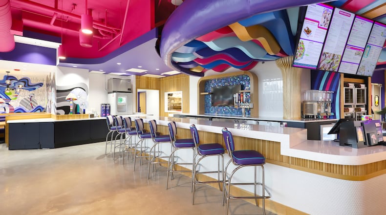 The interior of the Mellow Mushroom location in Grant Park features bright colors. / Courtesy of Mellow Mushroom