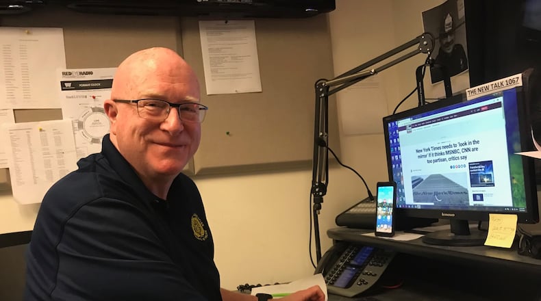 Mike Brooks preps for his final show on Talk 106.7.