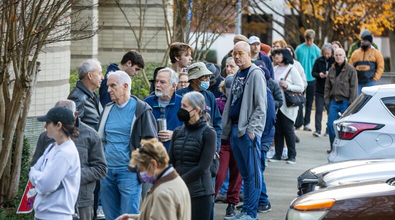 People wait in line to vote outside Atlanta’s Joan P. Garner Library at Ponce de Leon during the first day of advance in-person voting in Fulton County on Saturday, Nov.  26, 2022, for the runoff election. (Photo: Steve Schaefer/steve.schaefer@ajc.com)