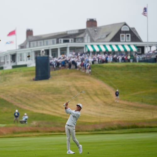 Miles Russell hits from the fairway on the first hole during the first round of the U.S. Open golf tournament at Shinnecock Hills Golf Club in Southampton, N.Y., Thursday, June 18, 2026.(AP Photo/David J. Phillip)