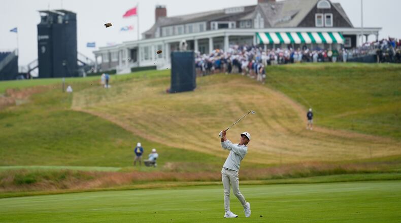 Miles Russell hits from the fairway on the first hole during the first round of the U.S. Open golf tournament at Shinnecock Hills Golf Club in Southampton, N.Y., Thursday, June 18, 2026.(AP Photo/David J. Phillip)