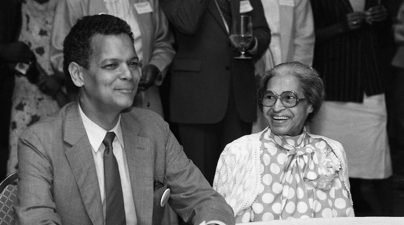 July 1986 -- Bond joins civil rights icon Rosa Parks at a campaign event in Atlanta.