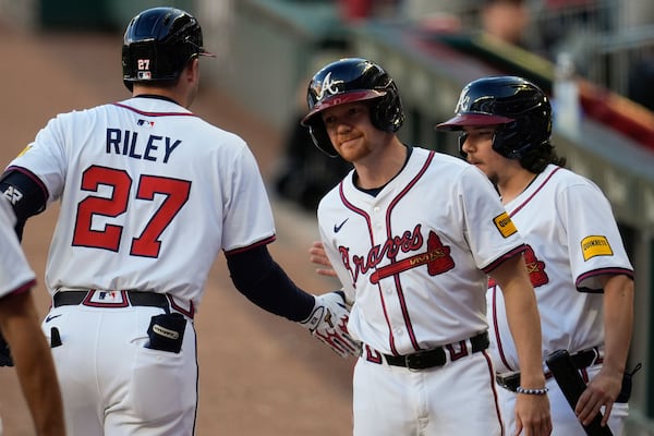 Atlanta Braves third baseman Austin Riley (27) celebrates after hitting a two-run homer against the Los Angeles Dodgers in the first inning of a baseball game, Sunday, May 4, 2025, in Atlanta. (AP Photo/Mike Stewart)