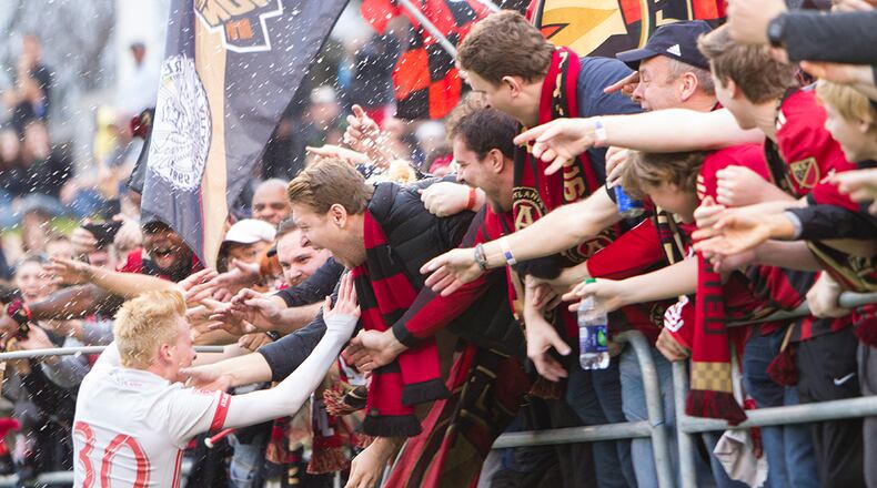 Andrew Carleton celebrates after scoring his goal in the second half of Atlanta United’s 4-0 win over Chattanooga on Saturday at Finley Stadium. (Miguel Martinez)