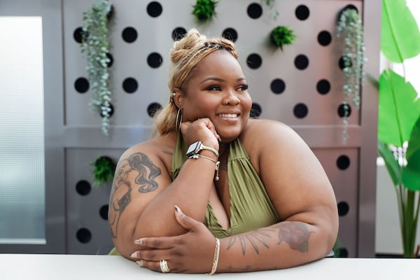 Kayla Life, founder and CEO of the Rebrand Institute of Tech Equity, poses for a photo at Digital Ignition coworking space in Alpharetta on Tuesday, Aug. 26, 2025. (Natrice Miller/AJC) 