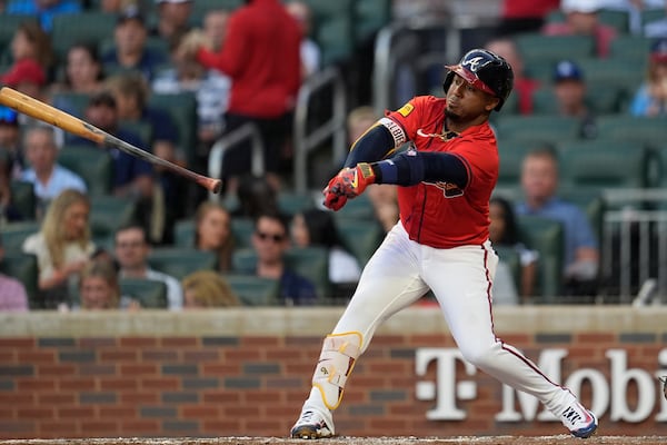 Atlanta Braves second baseman Ozzie Albies (1) loses the bat after stiking out in the second inning of a baseball gamem against the Los Angeles Dodgers, Friday, May 2, 2025, in Atlanta. (AP Photo/Mike Stewart)