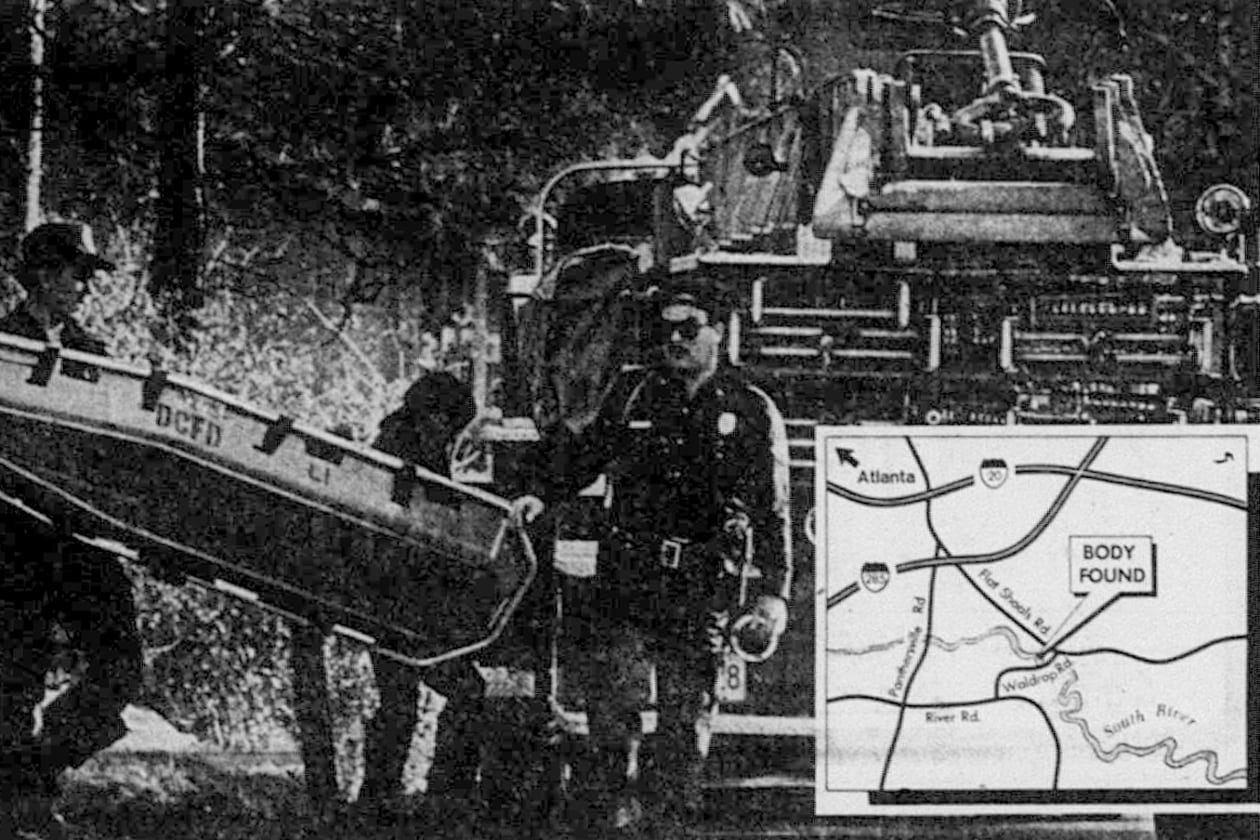Workers retrieve the body of Curtis Walker from South River in DeKalb County on March 6, 1981.