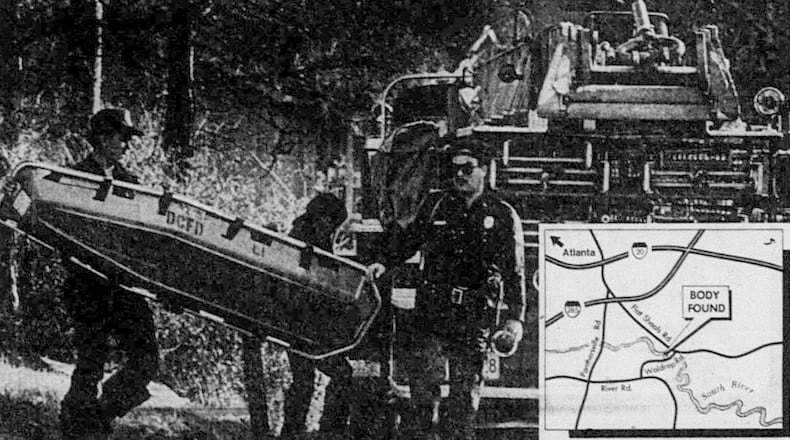 Workers retrieve the body of Curtis Walker from South River in DeKalb County on March 6, 1981.