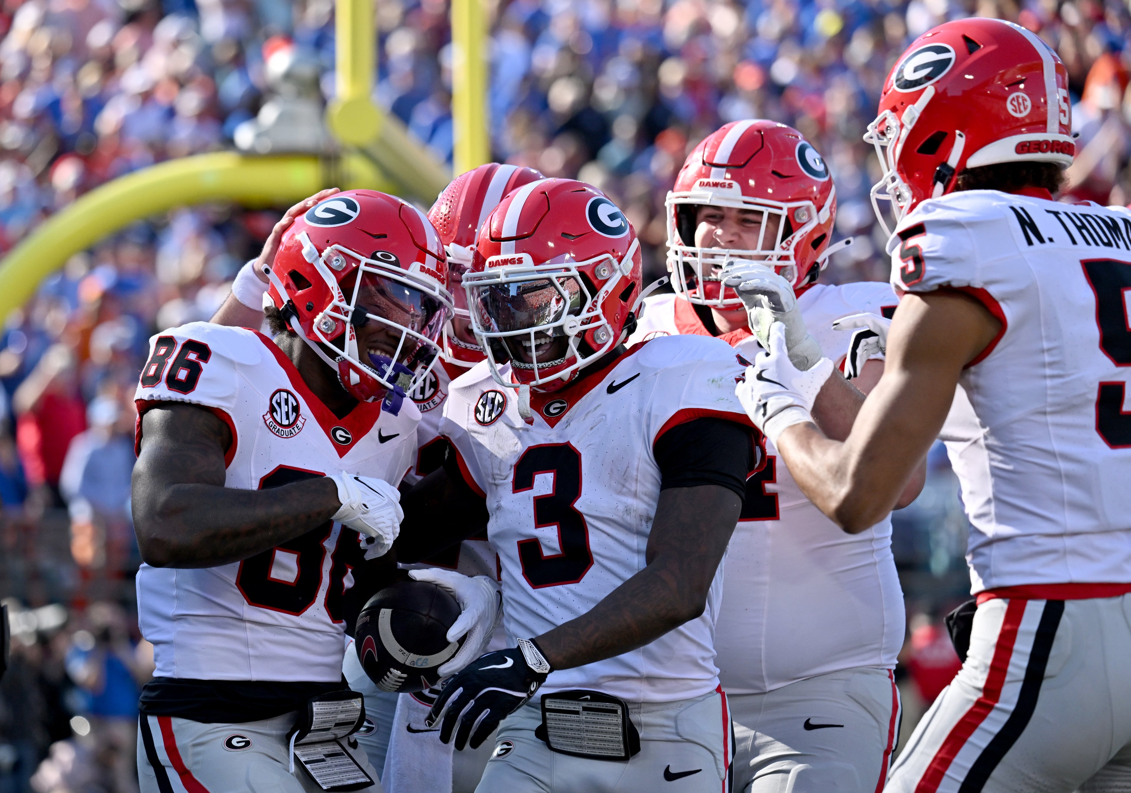Georgia wide receiver Dillon Bell (86) celebrates with teammates after scoring a touchdown during the first half in an NCAA football game, Saturday, November 1, 2025, Jacksonville, Fla. (Hyosub Shin / AJC)