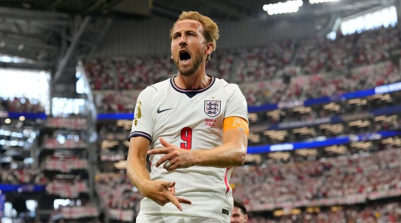 England's Harry Kane (9) celebrates after scoring a goal during the World Cup Group L soccer match between England and Croatia in Arlington, Texas, near Dallas, Wednesday, June 17, 2026. (AP Photo/Tony Gutierrez)