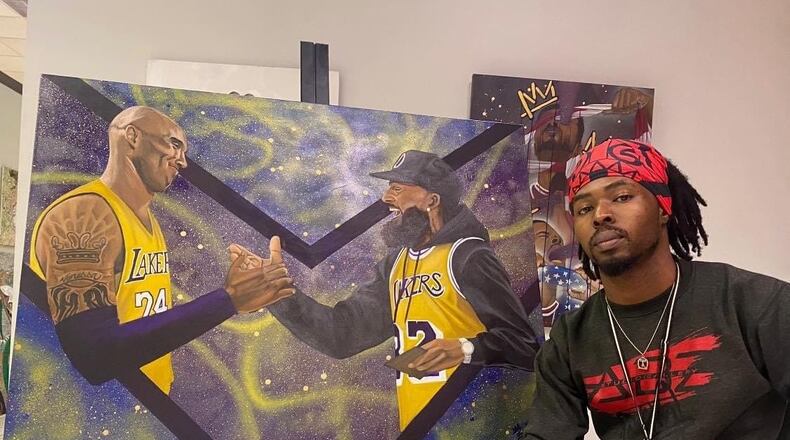 Xavier "Zay" Hutchins with his piece "Marathon Mentality." Photo courtesy of the artist