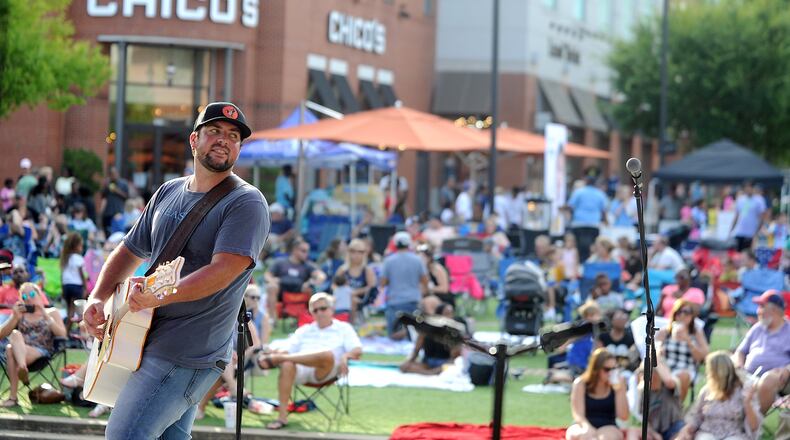 The Mall of Georgia's "Movies Under the Stars" series includes live music and activities for kids.