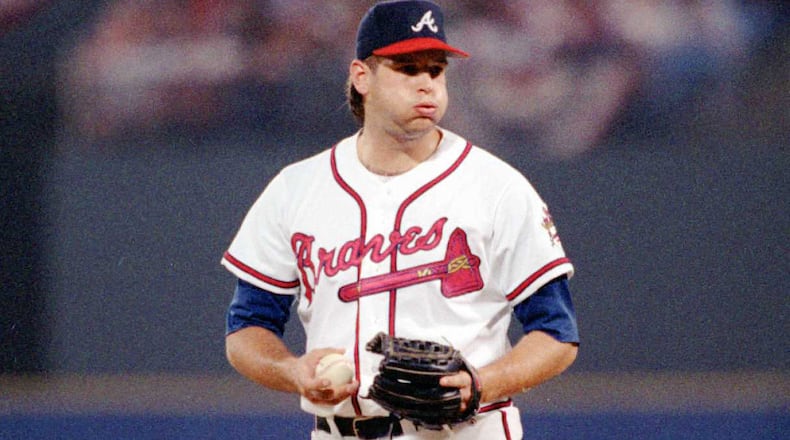 Braves reliever Mark Wohlers prepares to deliver a pitch during the 1995 National League Championship Series. (AJC file photo)
