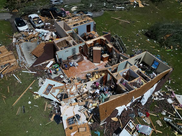 A home is destroyed after a severe storm passed the area on Saturday, May 17, 2025 in London, Ky. (AP Photo/Carolyn Kaster)