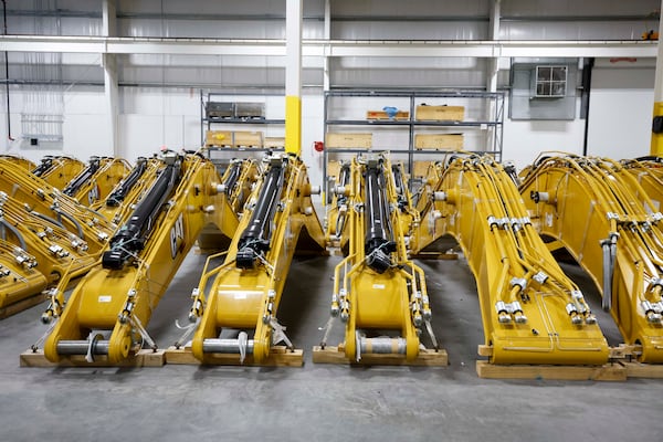 Heavy machinery components are prepared for assembly at a Georgia Port Authority facility in Brunswick, Ga. (Miguel Martinez/AJC)