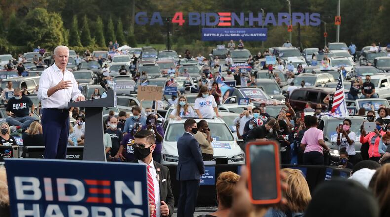 Democratic presidential candidate Joe Biden speaks at a drive-in rally event at the amphitheater at Lakewood during his October visit to Georgia. Georgia is set to officially award its 16 electoral votes to Biden when the Electoral College meets Monday. (Curtis Compton/Atlanta Journal-Constitution/TNS)