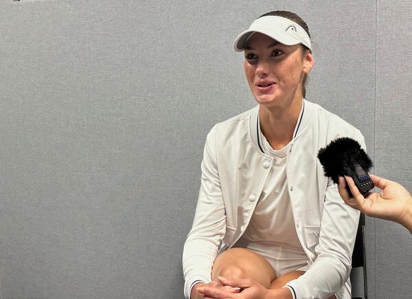 Carson Branstine, a tennis player who went to Texas A&M University and represents Canada, speaks to reporters at the All England Club in Wimbledon, London, Saturday, June 28, 2025. (AP Photo/Howard Fendrich)