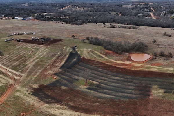 A crew applies biosolids to a field, Monday, Feb. 17, 2025, in Wellston, Okla. (AP Photo/Joshua A. Bickel)