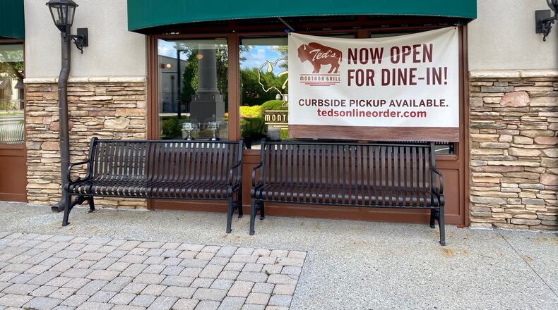 Peachtree Corners has modified its temporary sign permit ordinance to make it easier for retailers, restaurants and other businesses to let the public know they are open for business. (Karen Huppertz for the AJC)