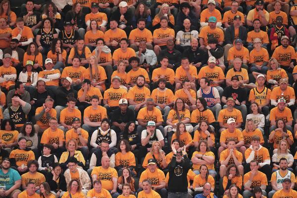 Fans watch during the second half of Game 3 of the Eastern Conference finals of the NBA basketball playoffs between the Indiana Pacers and the New York Knicks Sunday, May 25, 2025, in Indianapolis. (AP Photo/AJ Mast)