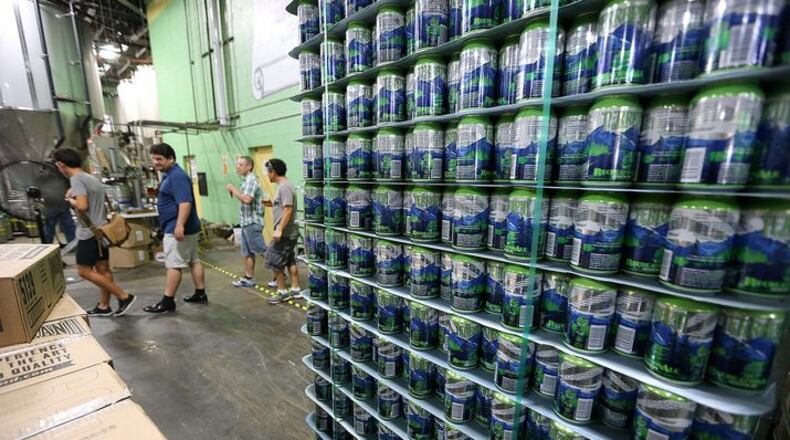 A tour group at Terrapin Beer Co. in Athens. Curtis Compton / ccompton@ajc.com