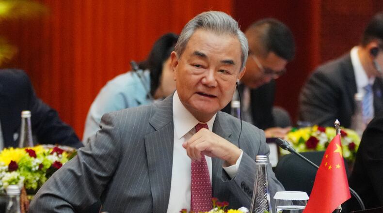 FILE - China's Foreign Minister Wang Yi attends the Comprehensive Strategic Dialogue between Indonesia and China in Jakarta, Indonesia, Friday, Aug. 21, 2026. (AP Photo/Tatan Syuflana, File)