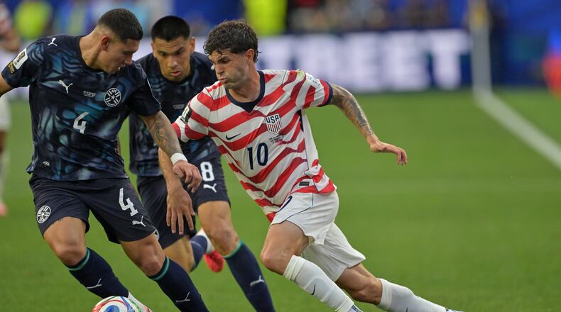 United States' Christian Pulisic (10) runs with the ball during the World Cup Group D soccer match between the United States and Paraguay in Inglewood, Calif., near Los Angeles, Friday, June 12, 2026. (AP Photo/Jayne Kamin-Oncea)