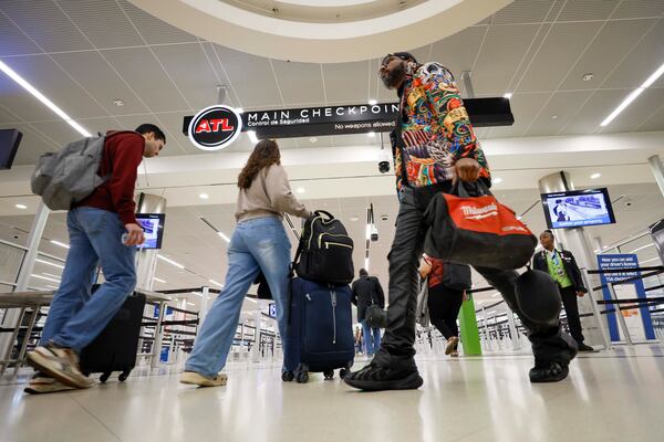 Travelers going through Hartsfield-Jackson Atlanta International Airport for the FIFA World Cup this summer will not only see (and not see) enhanced security, but may also see a soccer field in between terminals. (Miguel Martinez/AJC)