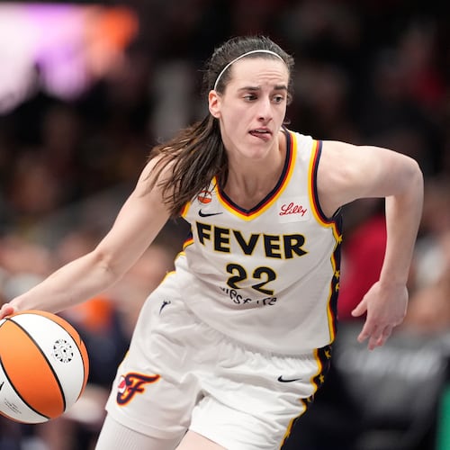 Indiana Fever guard Caitlin Clark (22) dribbles the ball in the second half of an WNBA basketball game against the Atlanta Dream Sunday, Aug. 16, 2026, in Atlanta. (AP Photo/Brynn Anderson)