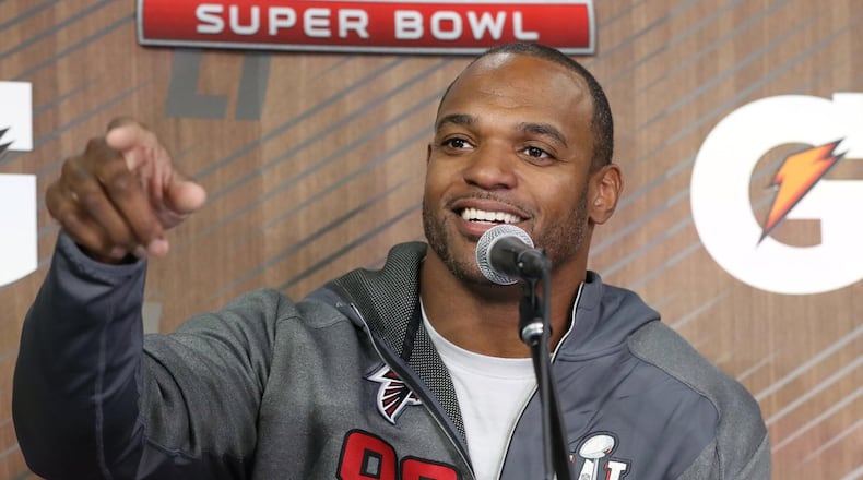Falcons Dwight Freeney takes a question on Super Bowl Opening Night on Monday, Jan. 30, 2017, at Minute Maid Park in Houston.