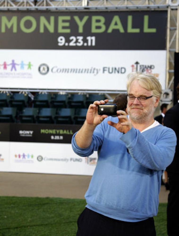 Cast, baseball figures attend the premiere of 'Moneyball'