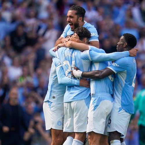 Manchester City's Josko Gvardiol (24) celebrates with teammates after scoring his side's second goal during the English Premier League soccer match between Manchester City and Bournemouth in Manchester, England, Sunday, Aug. 23, 2026. (AP Photo/Dave Thompson)