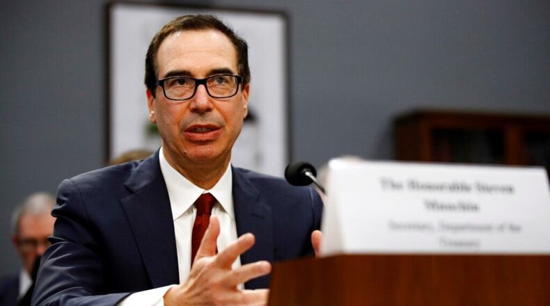 Treasury Secretary Steve Mnuchin testifies before the House Appropriations Committee during a hearing on President Trump's budget request for Fiscal Year 2020, Tuesday, April 9, 2019, on Capitol Hill in Washington. Mnuchin said Tuesday that his department intends to "follow the law" and is reviewing a request by a top House Democrat to provide Trump's tax returns to lawmakers.