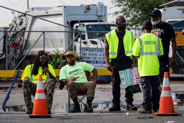 Philadelphia municipal workers, AFSCME District Council 33, strike outside the Sanitation Division, on Tuesday, July 1, 2025 in Philadelphia, Pa. (Alejandro A Alvarez /The Philadelphia Inquirer via AP)