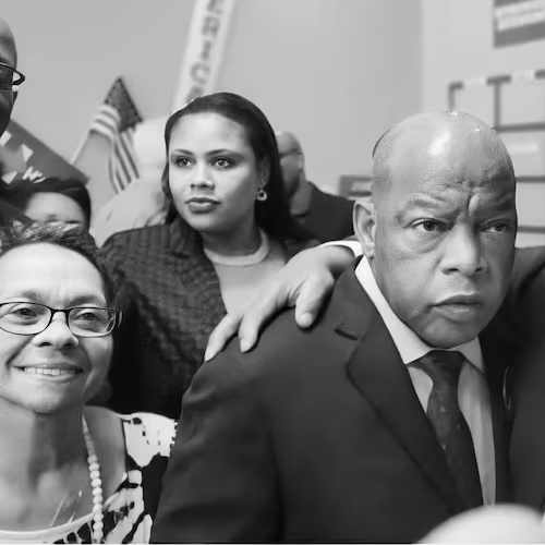 From left, Brenda Harris, U.S. Rep. John Lewis and Bishop Bill Harris. (Courtesy of Kenya Simmons)