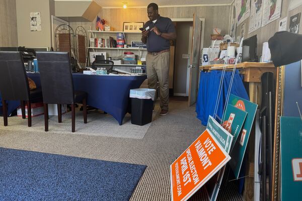 Escambia County Democratic Party Chair Derrick Scott works at the party's office in Pensacola, Fla. on March 18, 2025. (AP Photo/Kate Payne)
