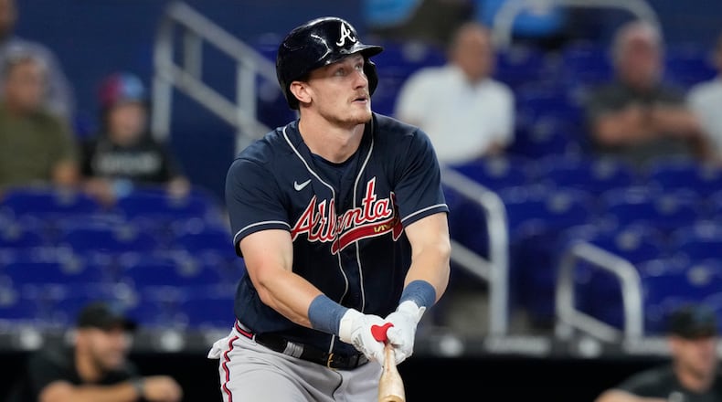 Atlanta Braves Sean Murphy (12) hits a double to center field during the first inning of a baseball game against the Miami Marlins, Thursday, May 4, 2023, in Miami. (AP Photo/Marta Lavandier)