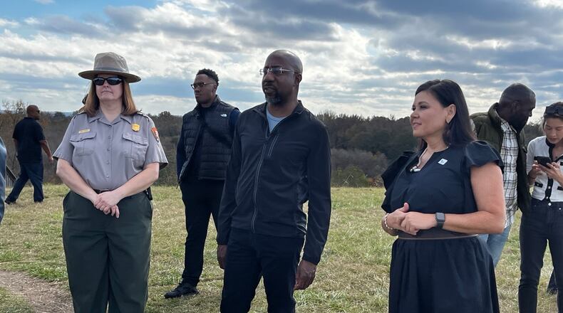 U.S. Sen. Raphael Warnock on Monday visits the Ocmulgee Mounds National Historic Park, which he and other Georgia leaders, in a bipartisan effort, hope to turn into the state's first national park and preserve. “To spend time on this land is to take seriously the complicated American story. So much rich culture. So many stories of a resilient people,” Warnock said. “We’re standing on holy ground.” Greg Bluestein/AJC.