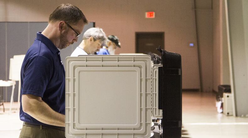 Cobb County residents take part in the primary election voting at Noonday Baptist Church in Marietta on Tuesday, May 22, 2018. REANN HUBER / REANN.HUBER@AJC.COM